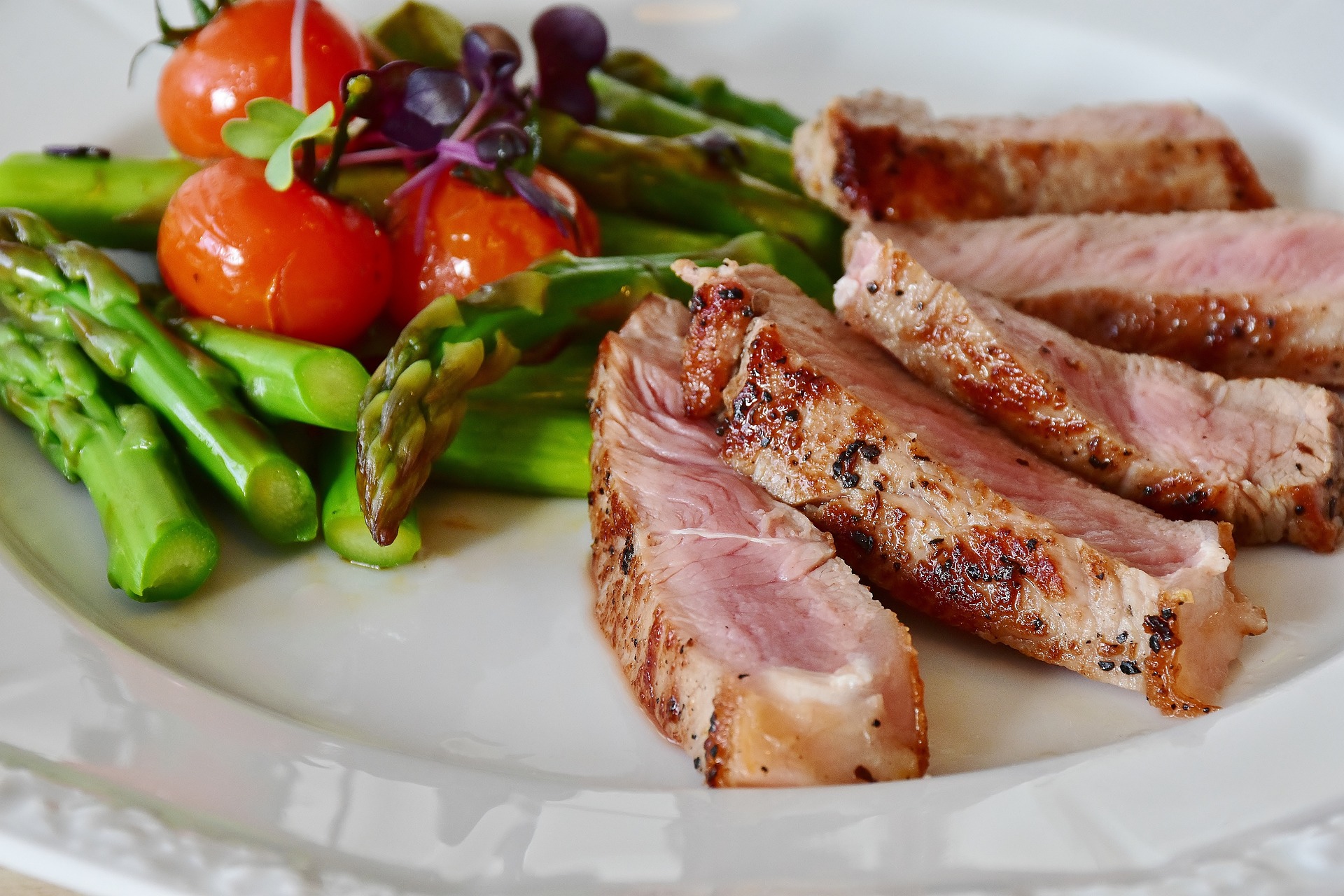 A good diet and mental health, such as this plate of asparagus and protein, are linked.